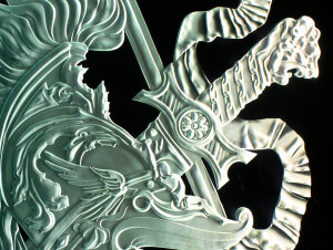 Detailed carving of crest in glass by Glass Graphics of Atlanta.