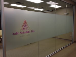 Printed corporate logo with graphic on film applied to glass office partition. All by Glass Graphics of Atlanta.
