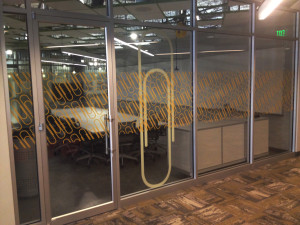Filmed glass office partition and door by Glass Graphics of Atlanta.