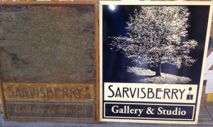 Reproduction of carved wood relief on film and applied to glass. All by Glass Graphics of Atlanta.