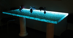 Textured glass table top with color-changing LED illumination by Glass Graphics of Atlanta.
