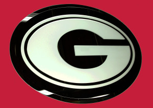 Sandblasted glass mirror displaying a college logo graphic by Glass Graphics of Atlanta.