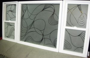 Sandblasted privacy glass for a garden tub window by Glass Graphics of Atlanta.