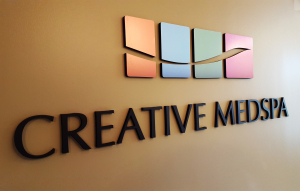 Corporate logo on dimensional letter sign by Glass Graphics of Atlanta.