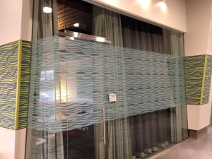 Printed graphic on film applied to glass office partition. All by Glass Graphics of Atlanta.