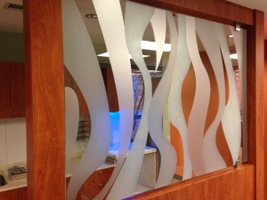 Graphic on film applied to glass office partition. All by Glass Graphics of Atlanta.