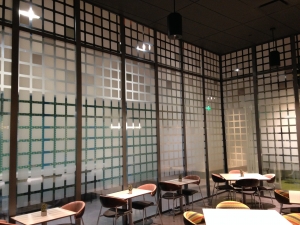 Printed graphic on film applied to glass dining room partition. All by Glass Graphics of Atlanta.
